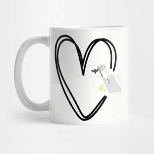 cute ghost catching a bat in a black heart Mug